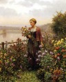 Femme dans une paysanne de jardin Daniel Ridgway Knight Flowers